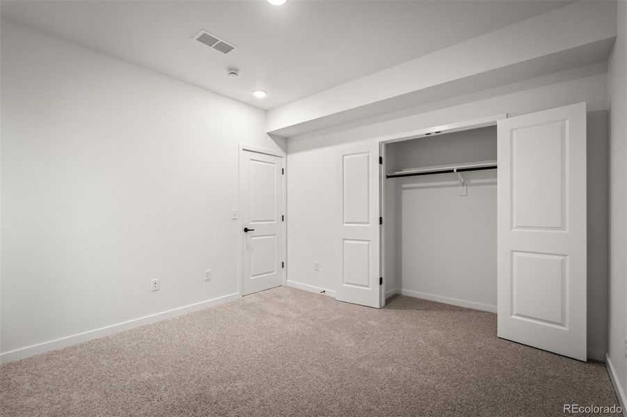 Spacious, unfurnished interior of a new home in Revel Crossing at Wolf Ranch – The Outlook Collection, Colorado Springs (Image 38).