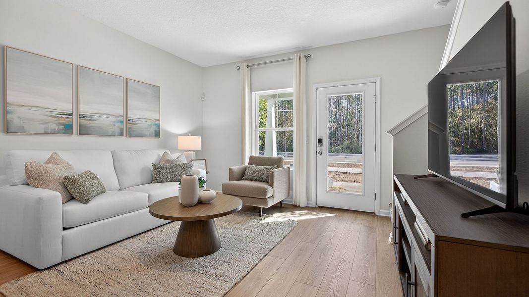 Representative furnished interior of a home built from the BRADFORD by D.R. Horton in Liberty Cove, Yulee (Image 6).