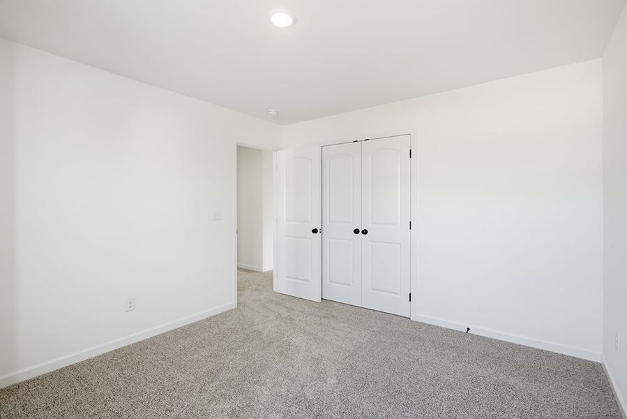 A room with white doors.