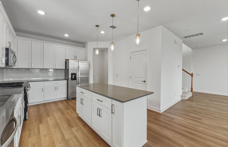 Furnished interior view inside a new home in Crosswinds, Kyle (Image 12).