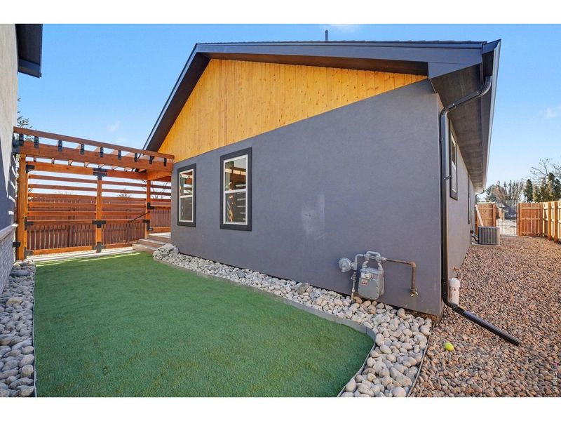 Exterior details and patio area of a home in , Dacono (Image 20).