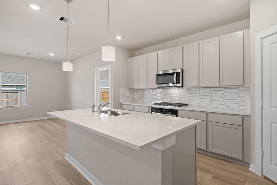 Furnished interior view inside a new home in Windrose Green 50', Angleton (Image 7).