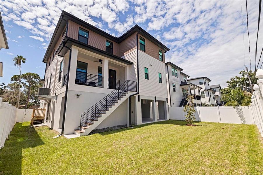 Front exterior of a new home in , St. Petersburg, FL, highlighting curb appeal (Image 25).