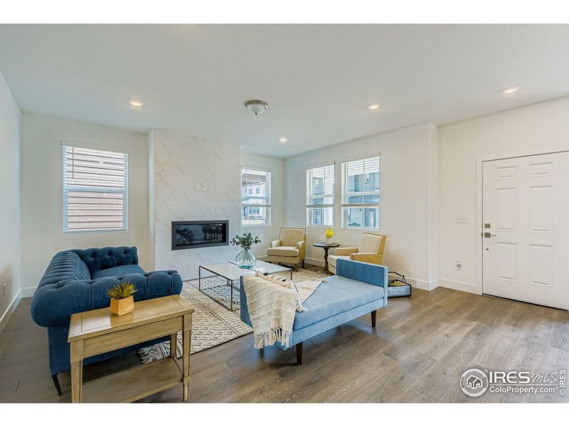 Great room centered around a gas fireplace