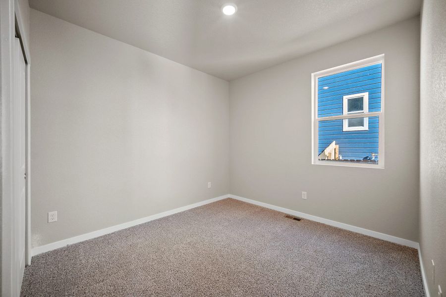 Spacious, unfurnished interior of a new home in Ridge at Lorson Ranch, Colorado Springs (Image 16).