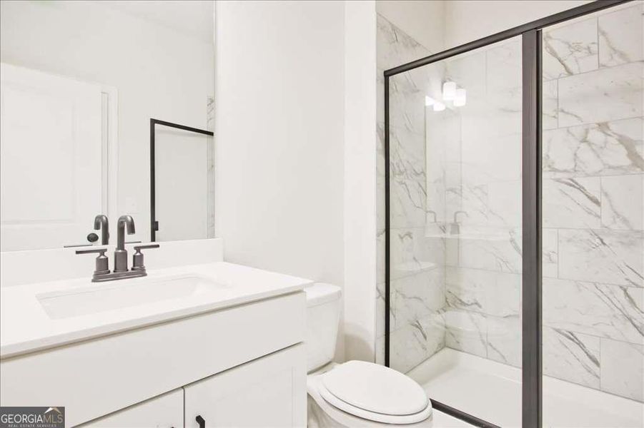 Furnished interior view inside a new home in The Paddocks at Doc Hughes, Buford (Image 30).