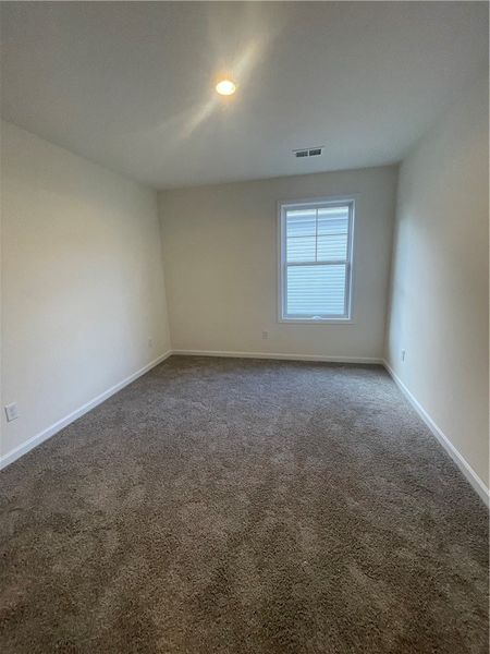 Spacious, unfurnished interior of a new home in Springwood Grove, Central (Image 29).