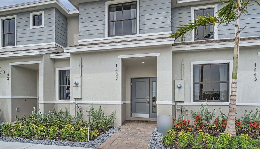 Exterior details and patio area of a home in Palm Cay, Florida City (Image 18).