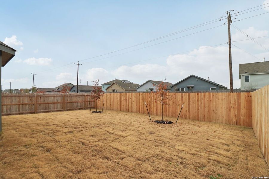 Exterior details and patio area of a home in Kallison Ranch, San Antonio (Image 29).