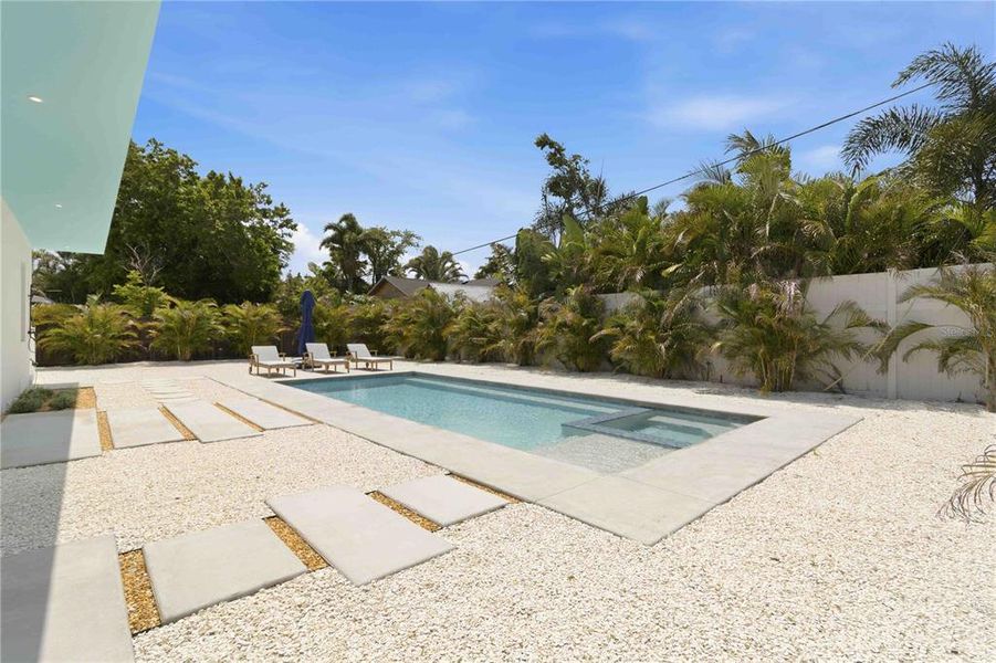 Exterior details and patio area of a home in , Sarasota (Image 25).