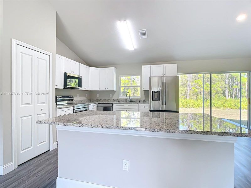 Furnished interior view inside a new home in , Port Charlotte (Image 4).