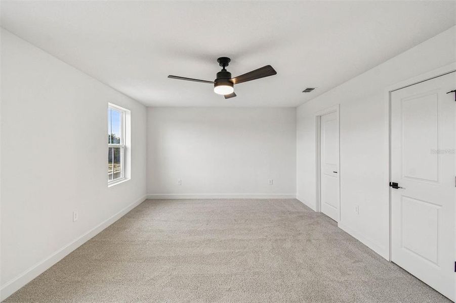 Spacious, unfurnished interior of a new home in Aspire at Canter Creek, Davenport (Image 19).