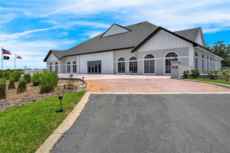 Front exterior of a new home in , Weeki Wachee, FL, highlighting curb appeal (Image 31).
