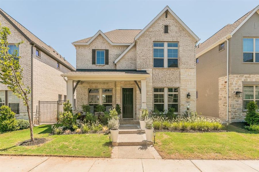 Front exterior of a new home in , Arlington, TX, highlighting curb appeal (Image 1).