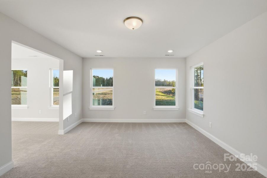 Primary Bedroom and Sitting Room