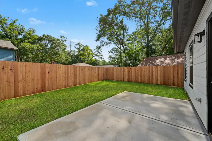 Exterior details and patio area of a home in , Conroe (Image 4). Exterior details and patio area of a home in , Conroe (Image 4).