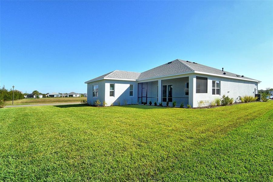 Exterior details and patio area of a home in Canoe Creek, Parrish (Image 19).
