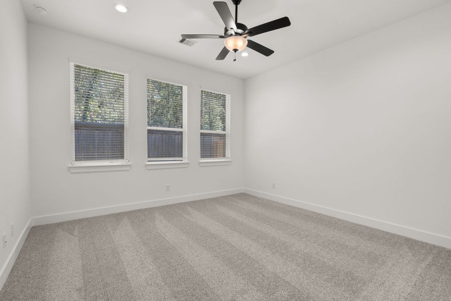 Representative unfurnished interior of a home built from the Dublin by Chesmar Homes in Sunterra, Katy (Image 9).