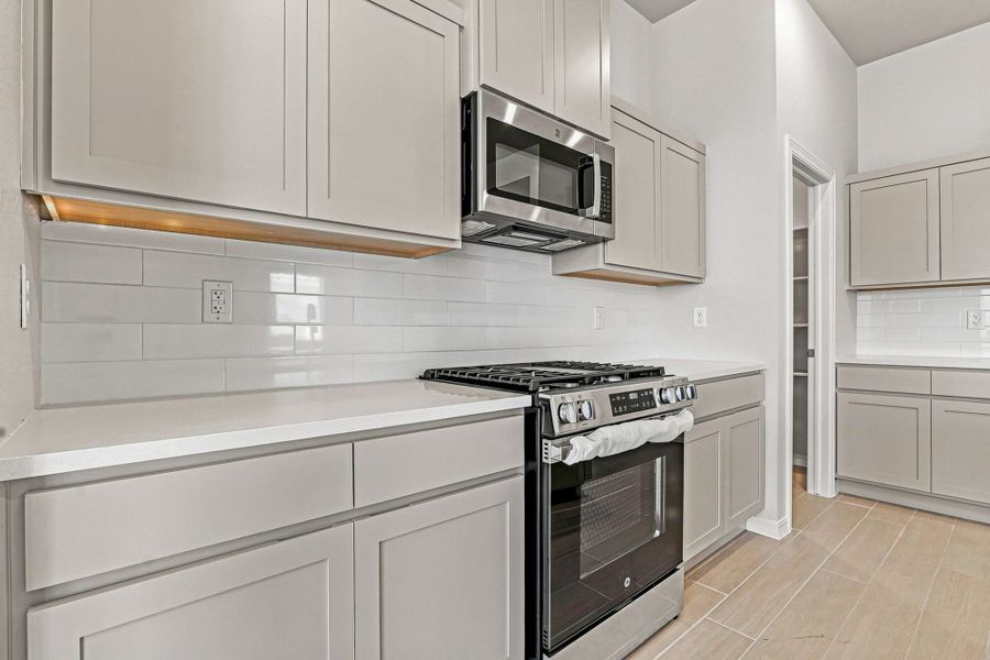 Furnished interior view inside a new home in Paseos Del Este, El Paso (Image 13).