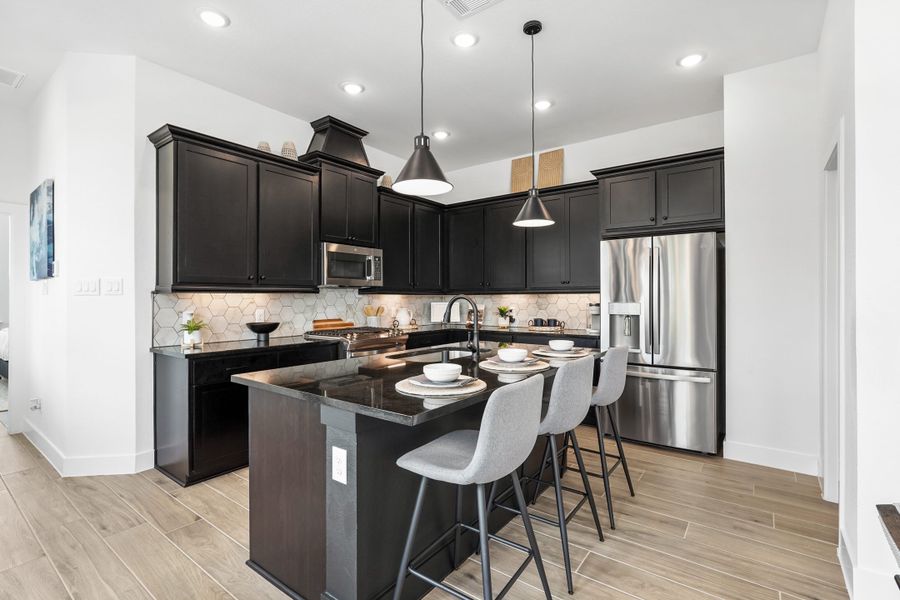 Furnished interior view inside a new home in Bridgeland, Cypress (Image 54).