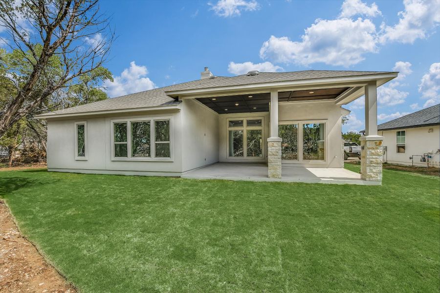 Exterior details and patio area of a home in The Hollows, Jonestown (Image 27).
