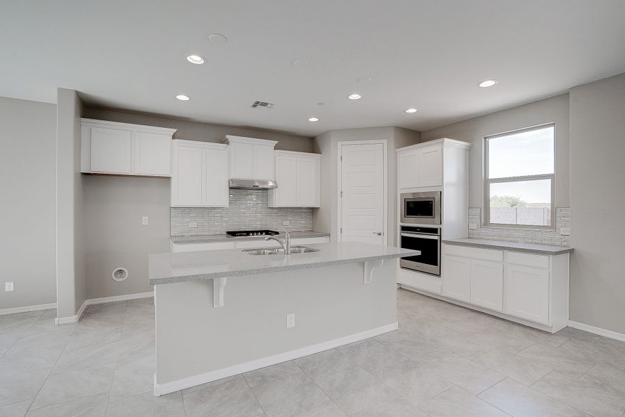 Representative unfurnished interior of a home built from the Castillo Series - Lavender by Brightland Homes in Castillo at Anderson Parc, Buckeye (Image 9). Representative unfurnished interior of a home built from the Castillo Series - Lavender by Brightland Homes in Castillo at Anderson Parc, Buckeye (Image 9).