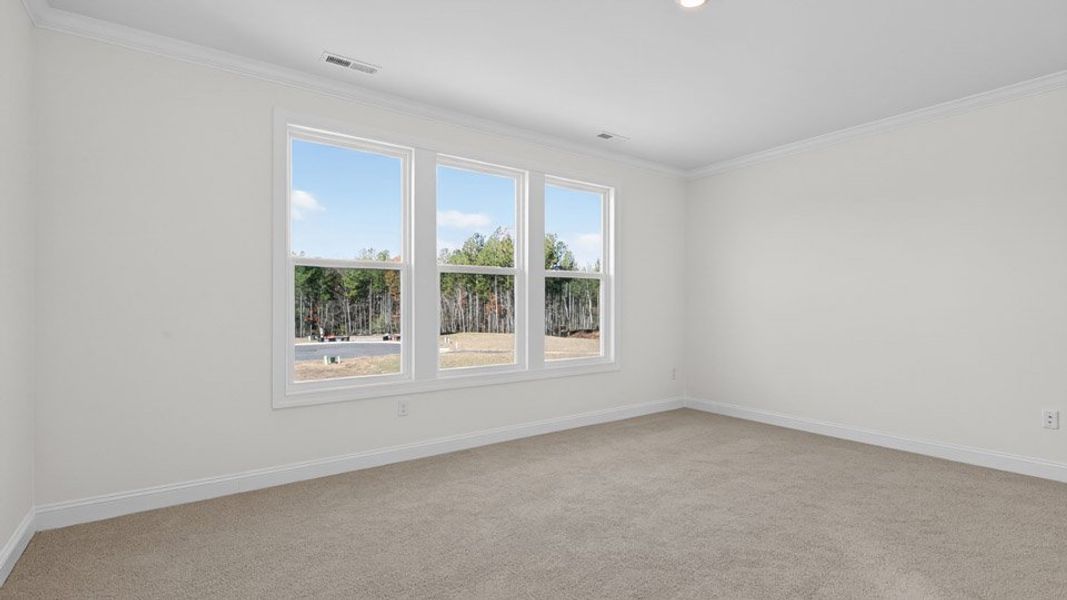 Representative unfurnished interior of a home built from the Hartwell by D.R. Horton in The Estates Park, Apex (Image 27).