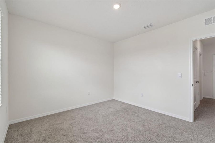 Spacious, unfurnished interior of a new home in Epperson, Wesley Chapel (Image 48).