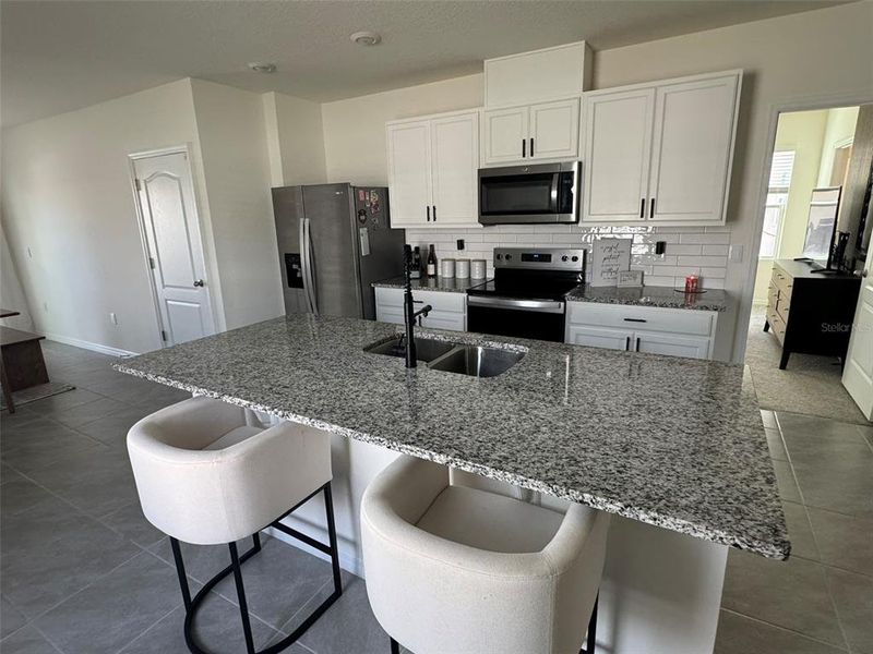 Furnished interior view inside a new home in Harmony West, St. Cloud (Image 9).
