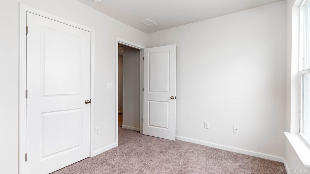 Spacious, unfurnished interior of a new home in Indigo Preserve, Leland (Image 22).