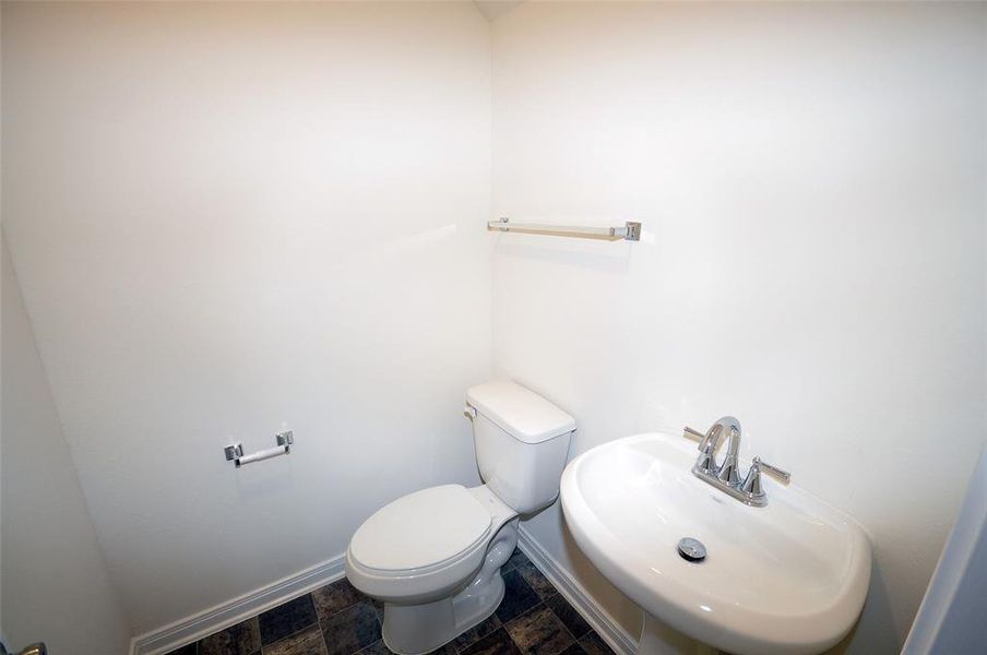 1/2 bath in finished area above the garage.