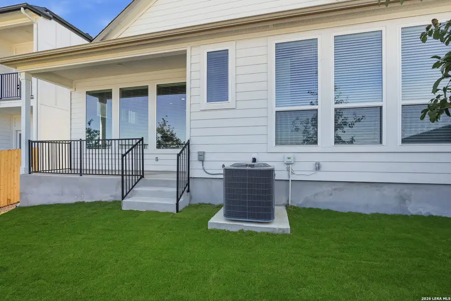 Exterior details and patio area of a home in Prominence, San Antonio (Image 19).
