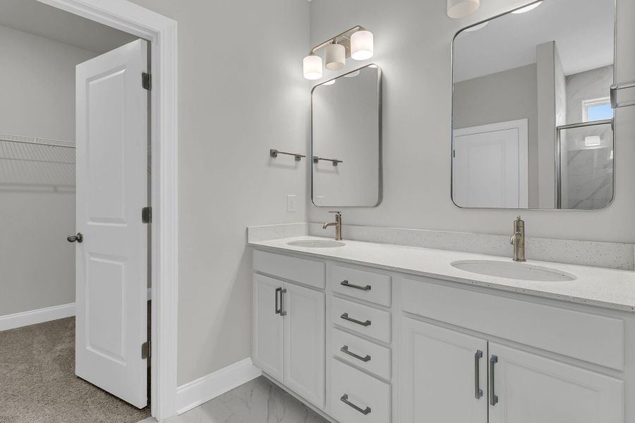 Furnished interior view inside a new home in Tidewater at Lakes of Cane Bay, Summerville (Image 12).