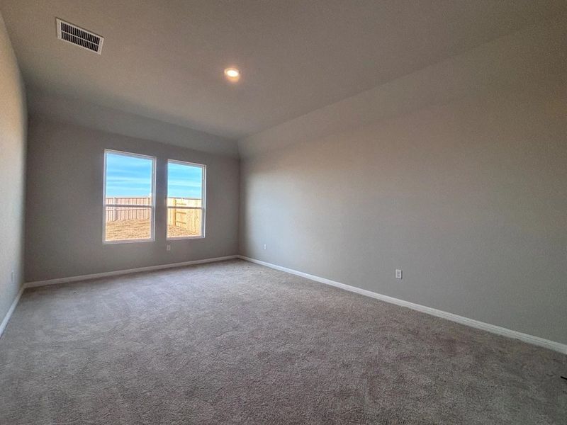 Spacious, unfurnished interior of a new home in The Colony, Bastrop (Image 20).