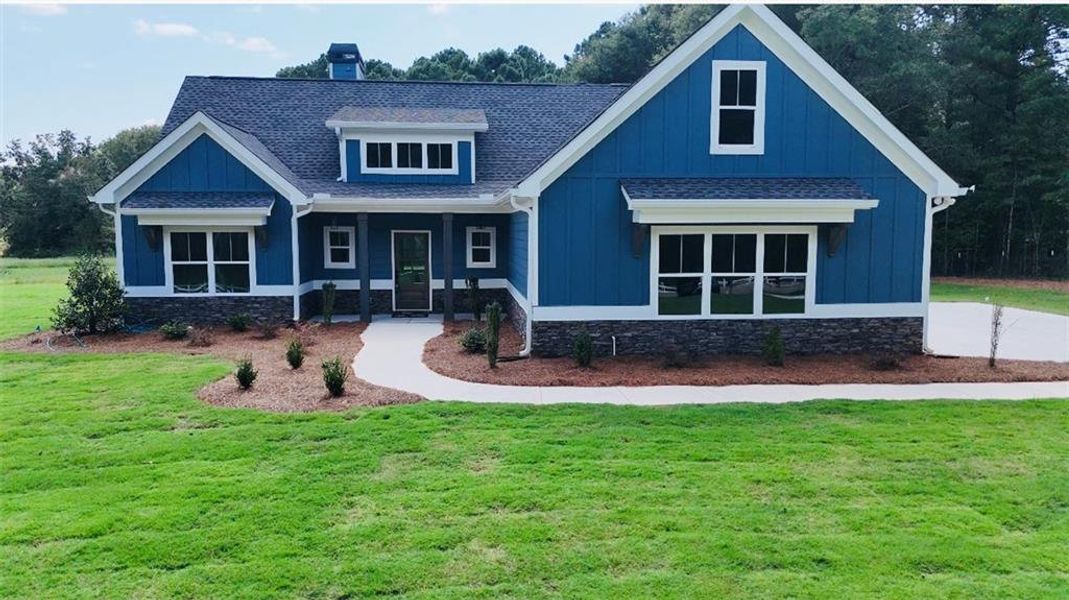 Front exterior of a new home in , Covington, GA, highlighting curb appeal (Image 22).