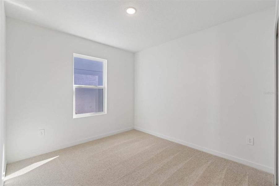 Spacious, unfurnished interior of a new home in Aspire at Canter Creek, Davenport (Image 17).