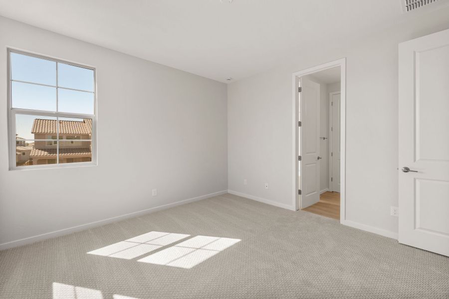 Spacious, unfurnished interior of a new home in Harvest - Enchantment Series, Queen Creek (Image 24). Spacious, unfurnished interior of a new home in Harvest - Enchantment Series, Queen Creek (Image 24).