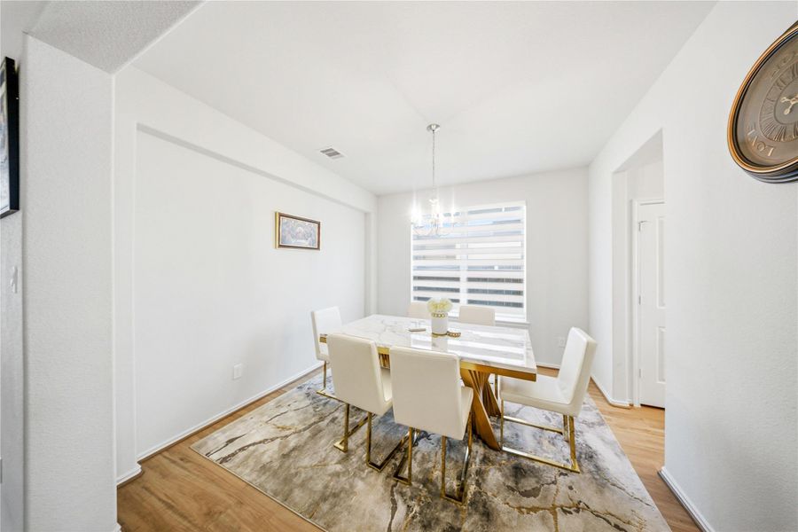 Furnished interior view inside a new home in Sierra Vista, Iowa Colony (Image 5).