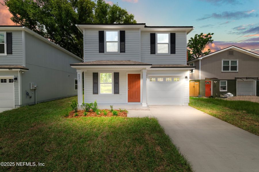 Front exterior of a new home in , Jacksonville, FL, highlighting curb appeal (Image 1). Front exterior of a new home in , Jacksonville, FL, highlighting curb appeal (Image 1).