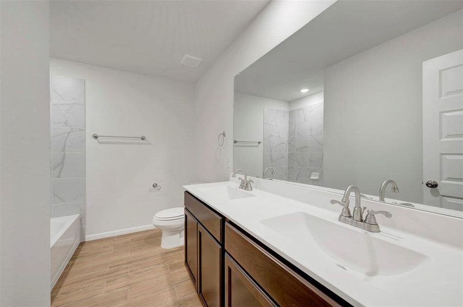 Furnished interior view inside a new home in Sagebrook, Argyle (Image 15). Furnished interior view inside a new home in Sagebrook, Argyle (Image 15).