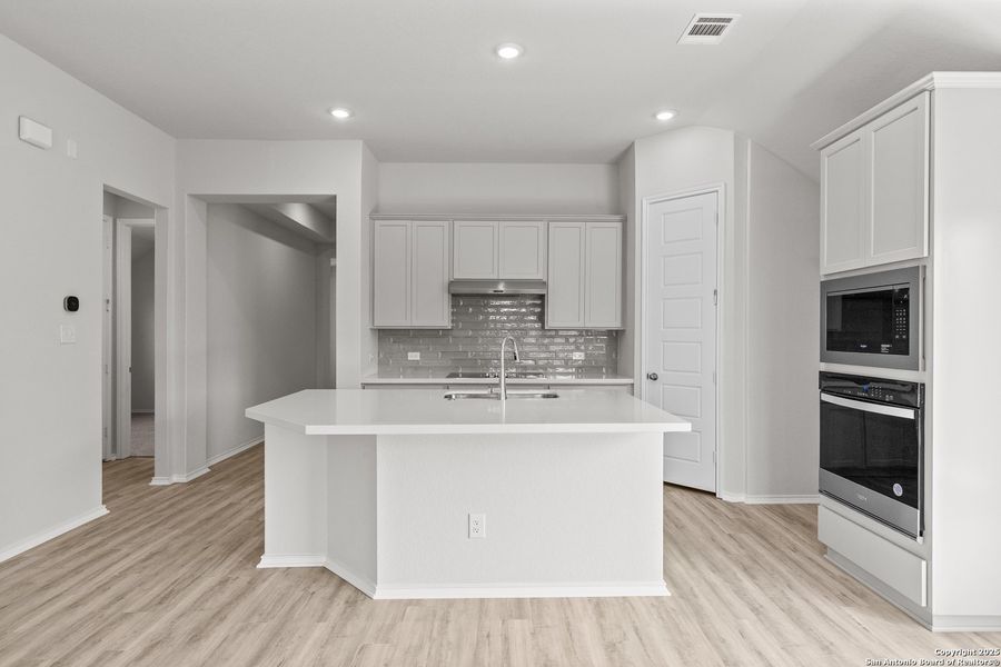 Furnished interior view inside a new home in Megan's Landing, Castroville (Image 15).