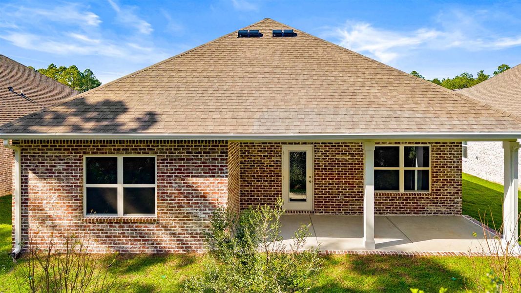 Exterior details and patio area of a home in Holley Grove at Peach Creek, Santa Rosa Beach (Image 3).