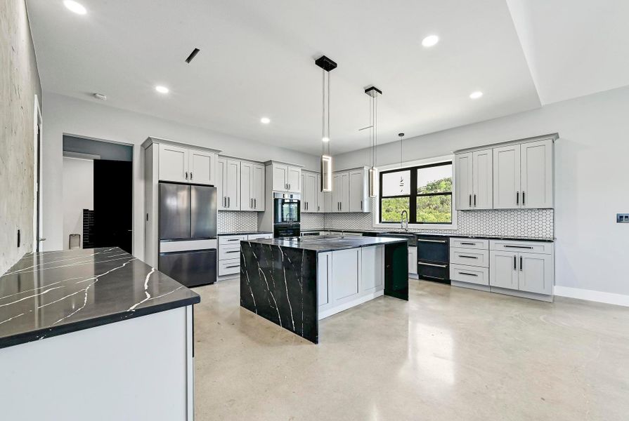 The stunning gourmet chef's kitchen is designed to make home cooking a breeze with state-of-the arts appliances and finishes to help you take your culinary art to the next level. The stunning gourmet chef's kitchen is designed to make home cooking a breeze with state-of-the arts appliances and finishes to help you take your culinary art to the next level.