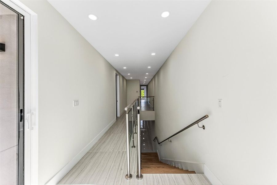 Long hall on second level.  Plenty of space for art!