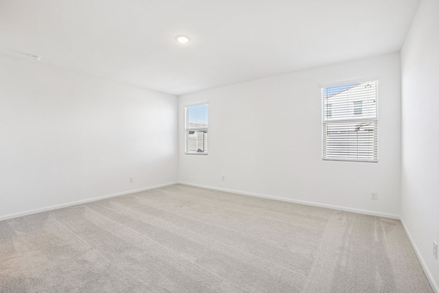 Primary suite. Finishes and options may vary by community