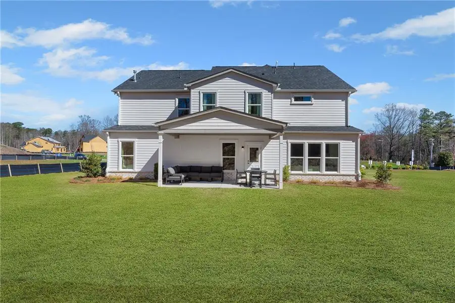 Exterior details and patio area of a home in Ashworth Estates, Powder Springs (Image 3).