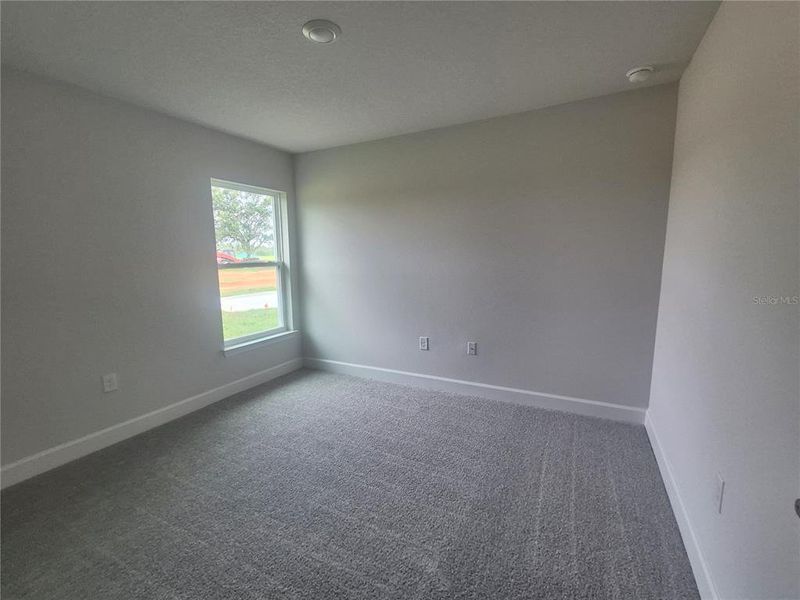 Spacious, unfurnished interior of a new home in Hill Country Estates, Dade City (Image 68).