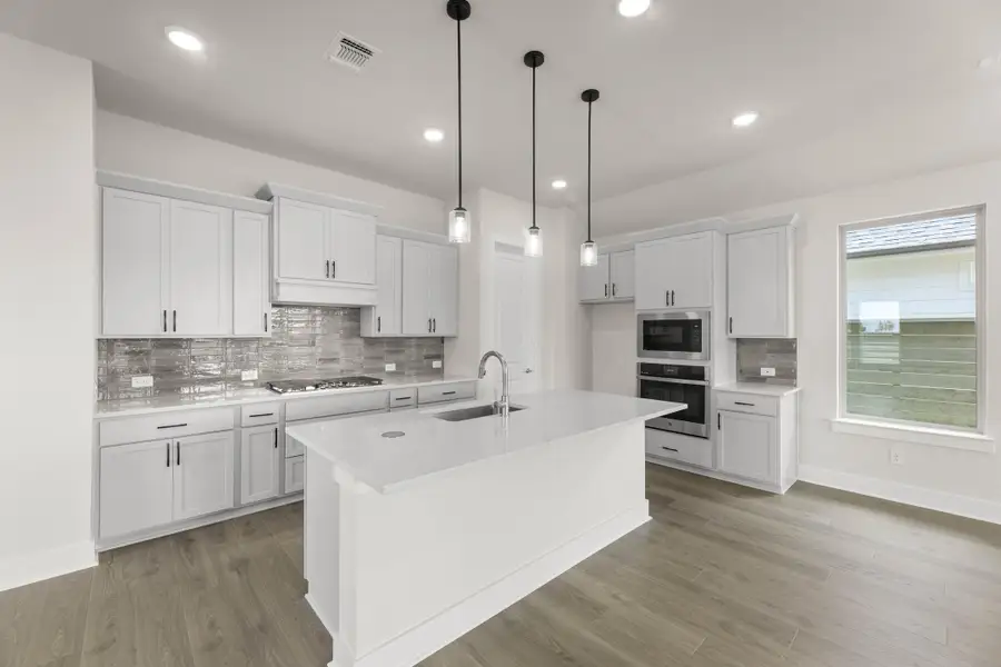 Representative furnished interior of a home built from the Hazel by Tri Pointe Homes in Treeline, Justin (Image 5).
