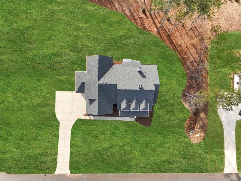 Exterior details and patio area of a home in Old Town Estates, Dacula (Image 4).