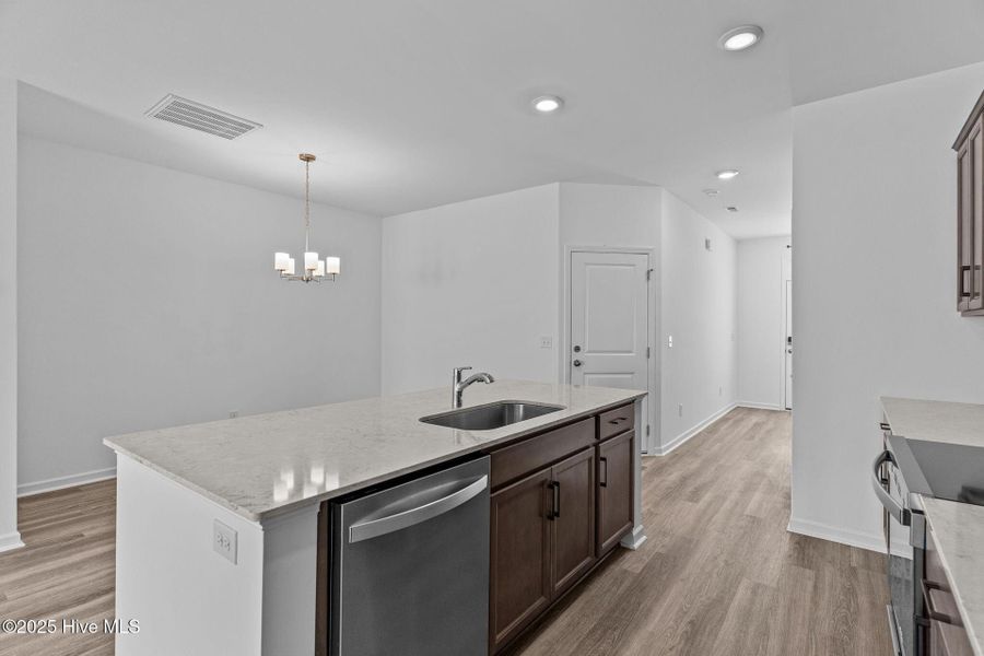 Furnished interior view inside a new home in Coastal Haven Townes, Leland (Image 12).